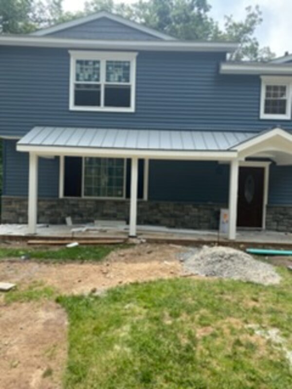New standing-seam porch roof